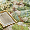 alt="Close up view of a quilt cover inspired by Vincent van Gogh's 'Blossoming Peach Tree' painting."