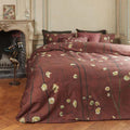 alt="Japanese-inspired quilt cover with a vibrant flowering plum orchard pattern on a deep red background."