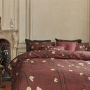 alt="Side view of a Japanese-inspired quilt cover with a vibrant flowering plum orchard pattern on a deep red background."