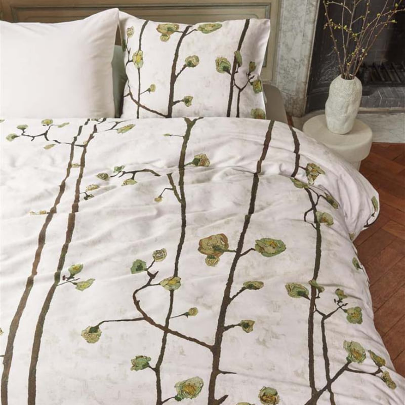 alt="Van Gogh Museum-inspired quilt cover with 'Flowering Plum Orchard' pattern in a luxurious bedroom"