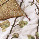 alt="Closer view of a Van Gogh Museum-inspired quilt cover with 'Flowering Plum Orchard' pattern"