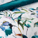 Close up detail of a gardenia prussian print quilt cover set, creating a tranquil and inviting atmosphere.