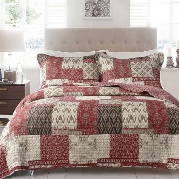 Classic coverlet set featuring a deep red, cream, and brown quilt with a patterned design, made of 100% cotton, fully machine washable.