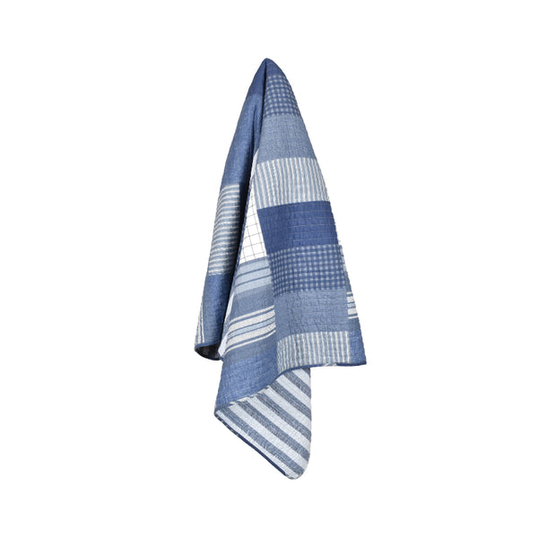 Geometric blue and white throw with checkered pattern, made of 100% cotton and fully machine washable for easy care.