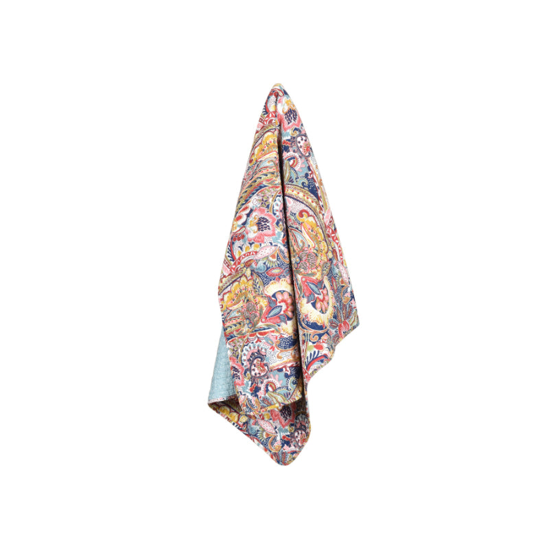 Colourful print throw with vibrant floral and paisley patterns in light blue, pink, red, yellow, and white.