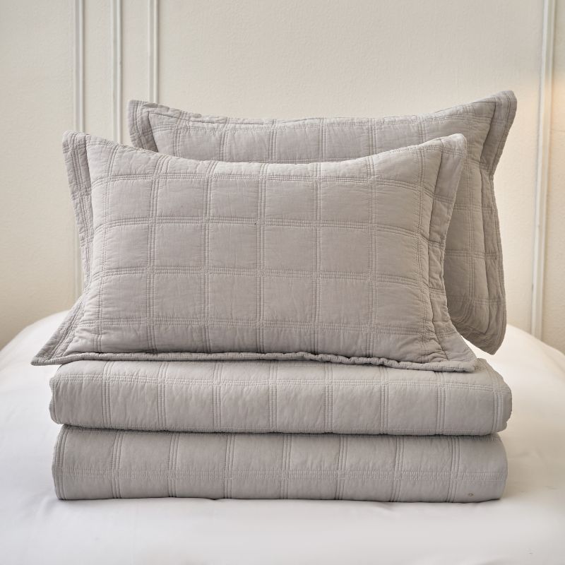 Classic Quilts coverlet in smokey grey adding calm and comfort to a bedroom.