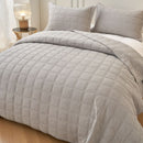 Classic Quilts coverlet in smokey grey adding calm and comfort to a bedroom.