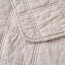 Classic Quilts Square Sand Coverlet styled neatly on a bed with matching pillowcases.