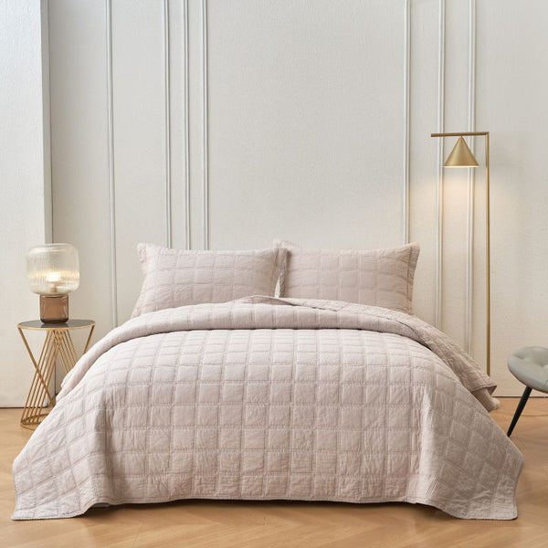 Classic Quilts Square Sand Coverlet styled neatly on a bed with matching pillowcases.