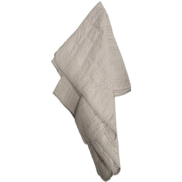 Classic Quilts throw draped to show its soft texture and stitching.