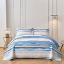 Classic Quilts Windsor Ocean Coverlet styled on a bed with matching pillowcases.