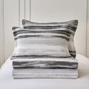 Classic Quilts Windsor Stormy Coverlet styled on a bed with matching pillowcases.