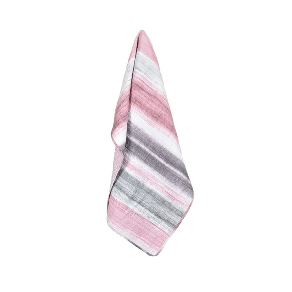 A shade of pink, grey, and white throw made of 100% cotton features varying widths and textured stripes for a modern, casual look.