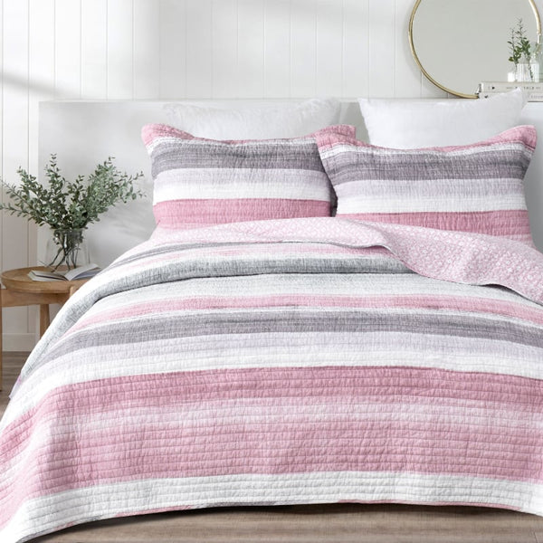 Contemporary coverlet set showcasing varying widths and textured stripes for a modern-style bedroom.