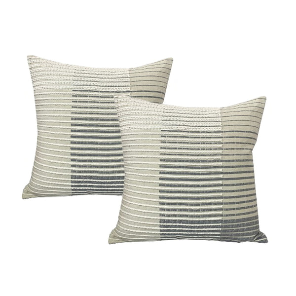 Exquisite twin pack feather-filled cushions in grey showcase a mesmerising interwoven line pattern. Meticulously crafted from fine cotton tape, these cushions create a captivating optical illusion, breathing life into a graduating linear design.
