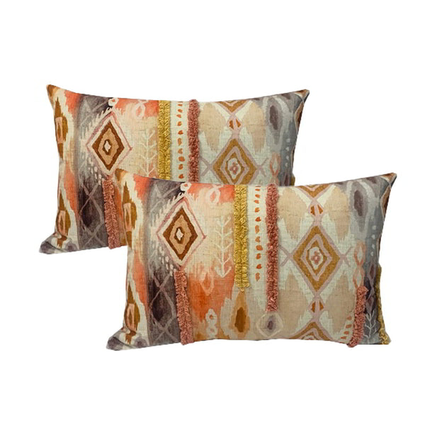 alt="Vibrantly patterned twin pack feather-filled cushions, boasting a perfect bohemian aesthetic with their colourful tribal designs and inviting tufted accents."
