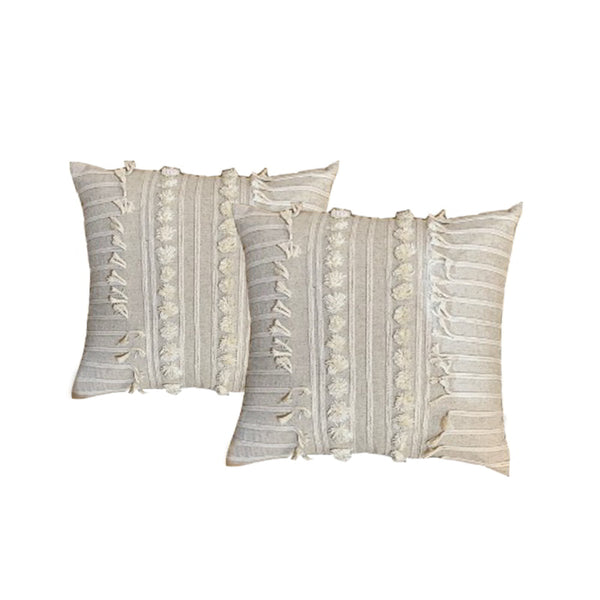 Indulge in the opulence of fringed and ruffled polyester-filled natural cushions, enhancing the beauty of your linen collection.