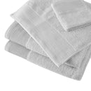 A collection of soft grey towels, made from eco-conscious Tencel and cotton, designed for luxury and effective hygiene.