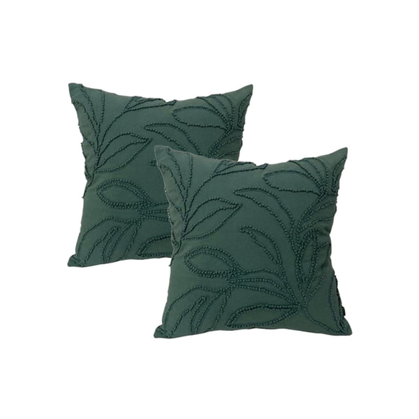 Elegant teal feather-filled cushions featuring delicate leaf embroidery on soft cotton canvas add a touch of luxury to any space.