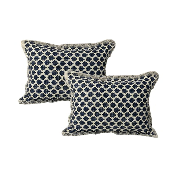 Exquisite grey feather-filled cushions boasting intricate geometric patterns and meticulously woven textured accents