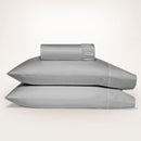 Luxurious Ddecor Home 1500 Thread Count Silver Fitted Sheet and Pillowcase Set, combining cotton and polyester for comfort and easy care.