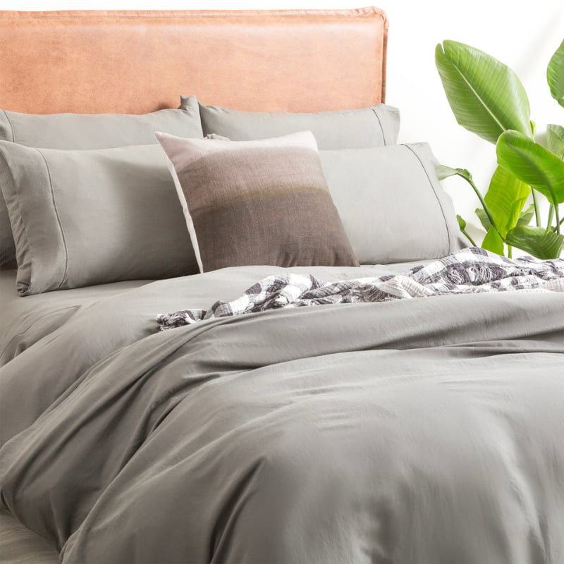 Elegant bed featuring granite microfibre quilt cover set, creating a seamless look for your bedding.