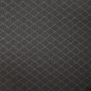 Close up look grey recliner chair covered with a textured slipcover, enhancing comfort and style.