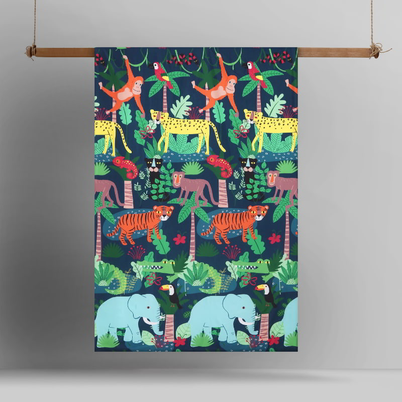 alt="A hanging glow in the dark quilt cover set with captivating, colourful rainforest design featuring white, black, blue, red, orange, grey, yellow, and green tones"