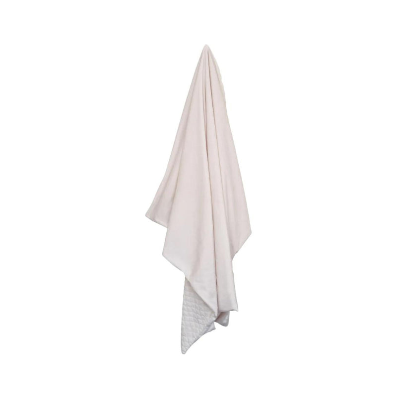 Back details of the luxe white throw with scallop pattern, perfect for winter warmth and adding texture to your space.
