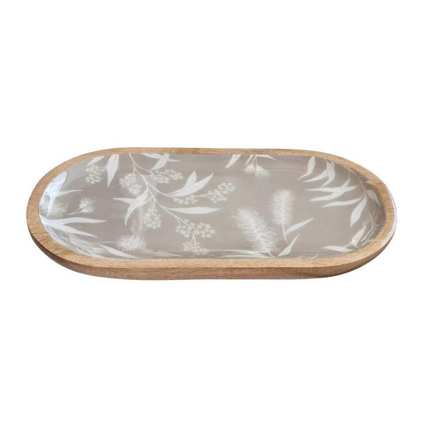 alt="Side details of a grey oval serving tray featuring a natural native flora"