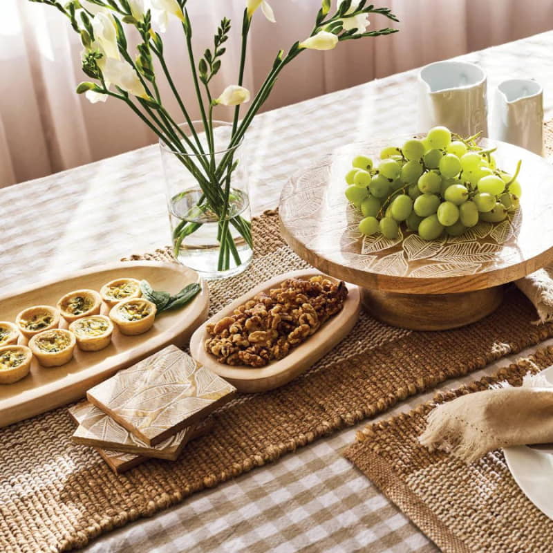 alt="A foods and other collections with our Jute runner featuring its unique and tactile feel."