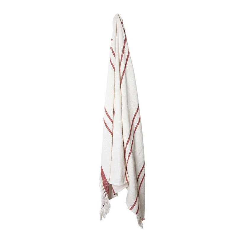 alt="Front view of an ivory and brick throw with subtle stripe design and tassels"
