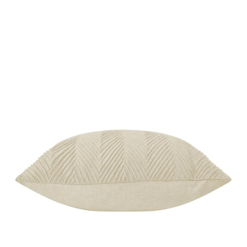 alt="Side details of a stunning cream cushion with an embossed chevron design on high-quality cotton fabric"