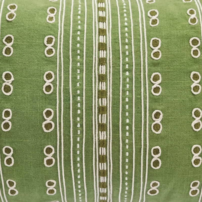 alt="Close up details of a stylish green cushion featuring a fully embroidered striped design"