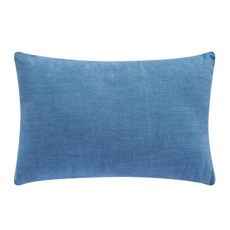 alt="Back details of a stylish blue cushion featuring a fully embroidered striped design"