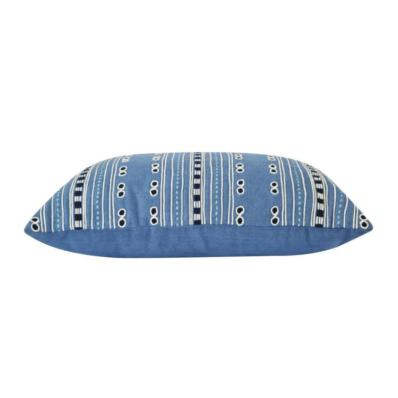 alt="Side details of a stylish blue cushion featuring a fully embroidered striped design"