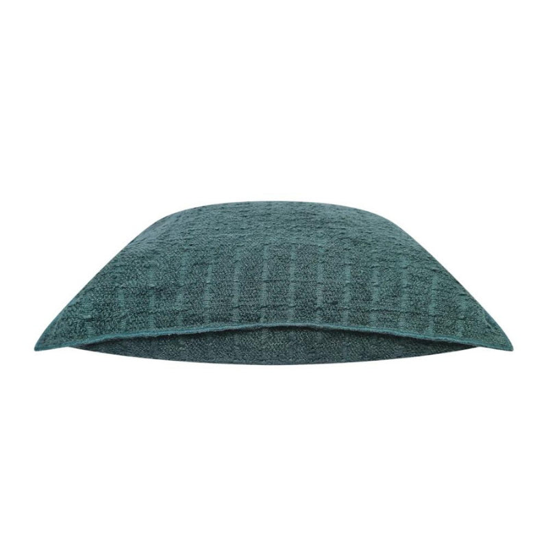 alt="Stunning green cushion featuring a soft, durable boucle fabric"