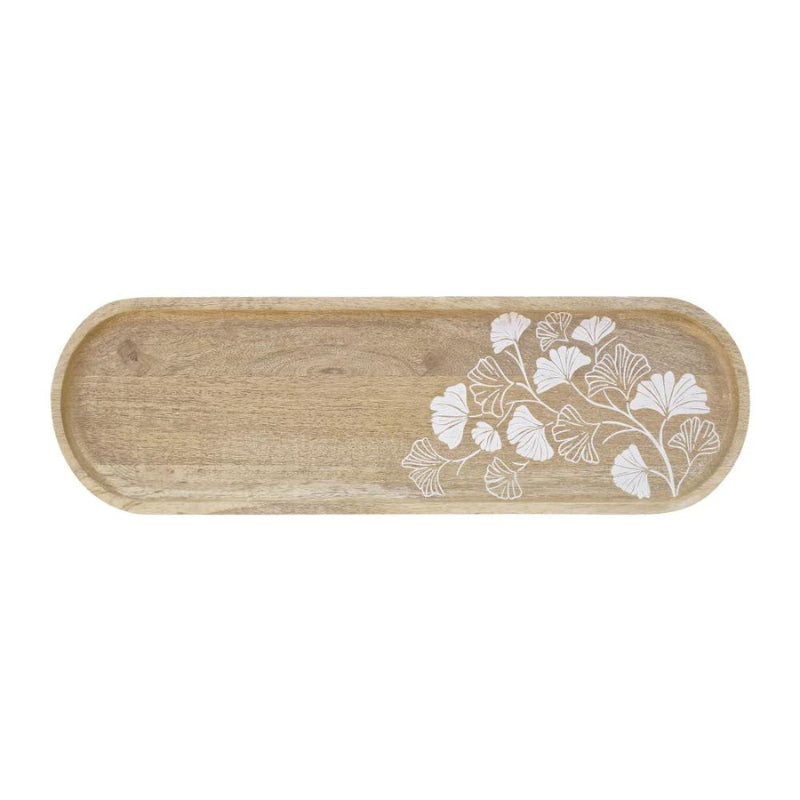 alt="Front details of a natural long serving tray featuring hand-carved ginkgo leaf design"