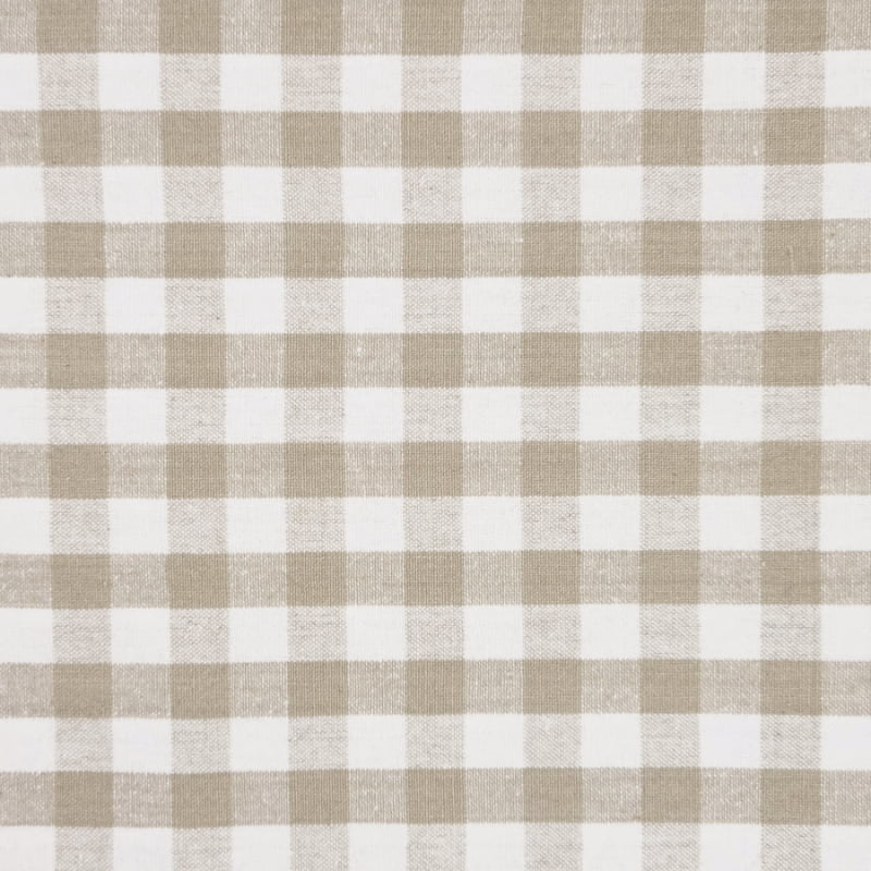alt="a close-up details of a grey, white, and beige patterned fabric"