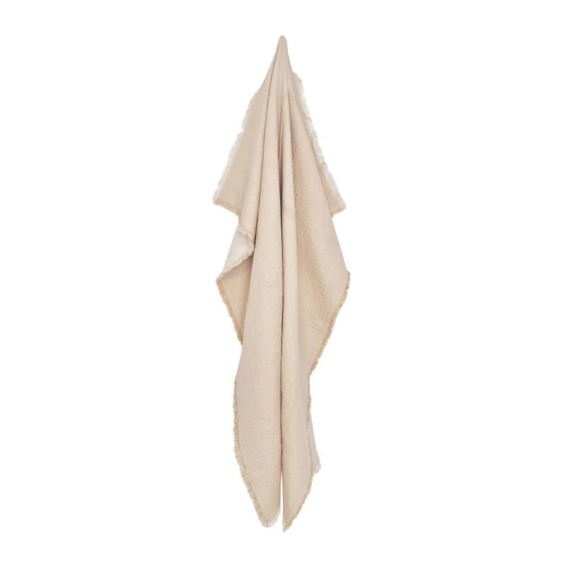 alt="Front details of a plain warm taupe and cream throw"