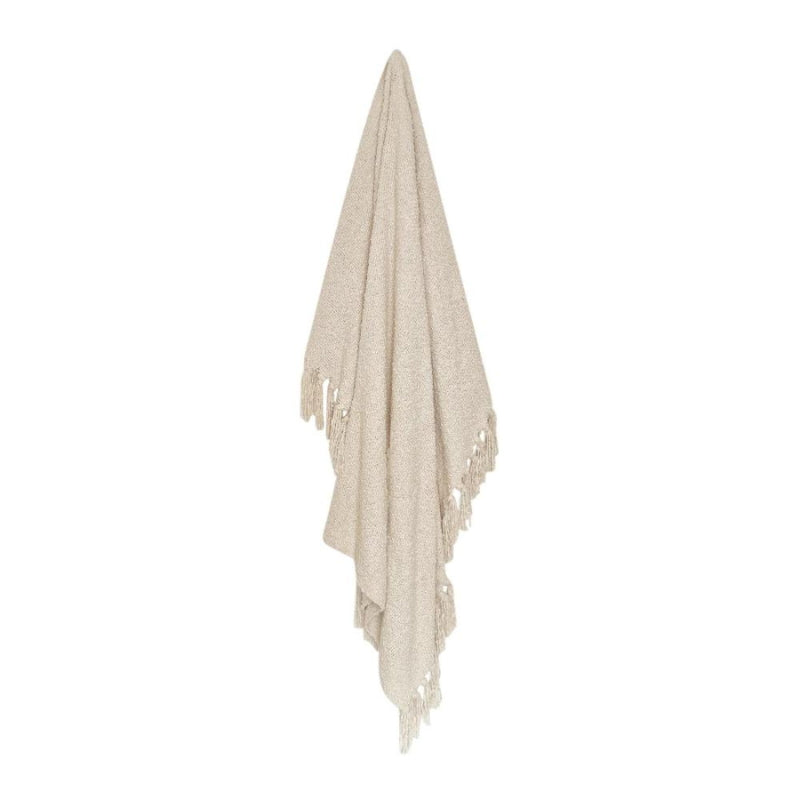 alt="Front details of a cream throw with tassel details"
