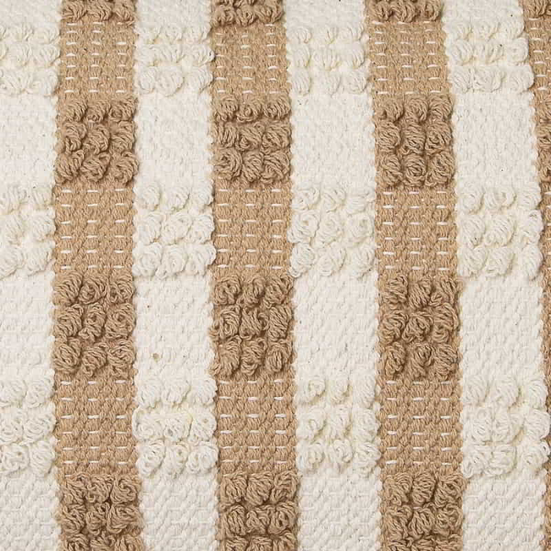 alt="Closer details of a cream and white cushion featuring thin stripes design"