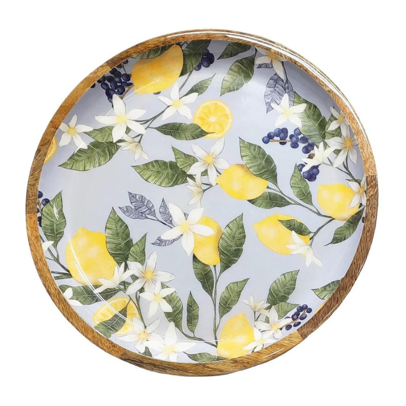 alt="Front details of a Lemon sky round serving tray featuring hand-carved lemon with leaf design"