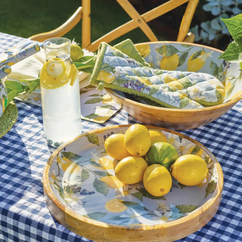 alt="A Lemon sky round serving tray with other colllections featuring hand-drawn lemon with leaf design"