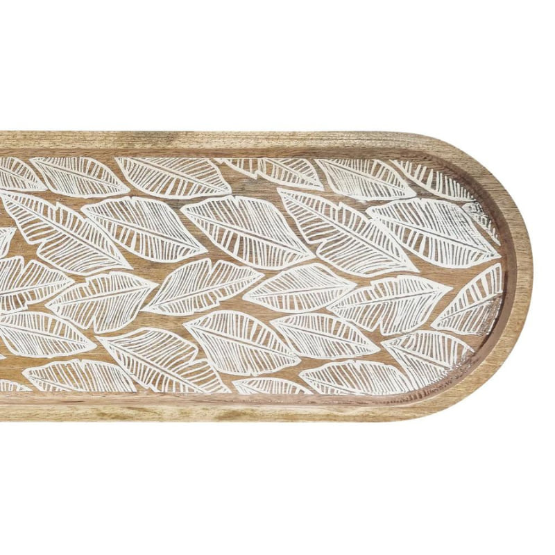 alt="close-up photo details of natural long serving tray feauturing a handcrafted delicate leaf design from high-quality mango wood."