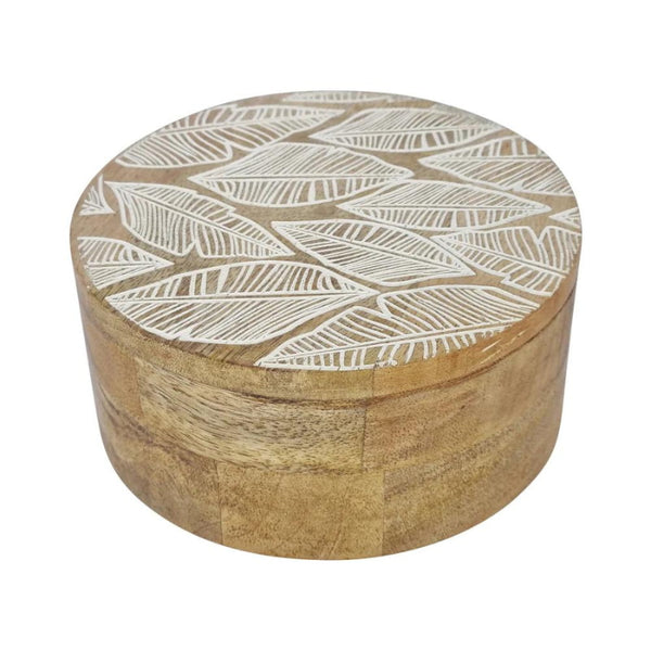 alt="Front details of natural round trinket box featuring hand-carved with a delicate leaf design"