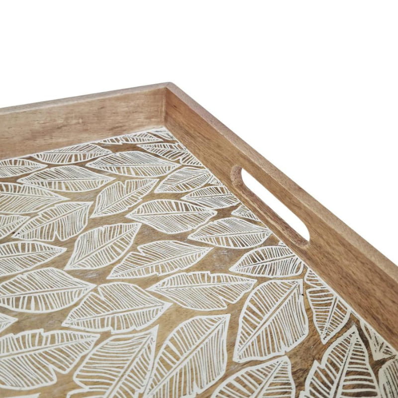 alt="A close-up natural serving tray  featuring a handcrafted delicate leaf design from high-quality mango wood in.