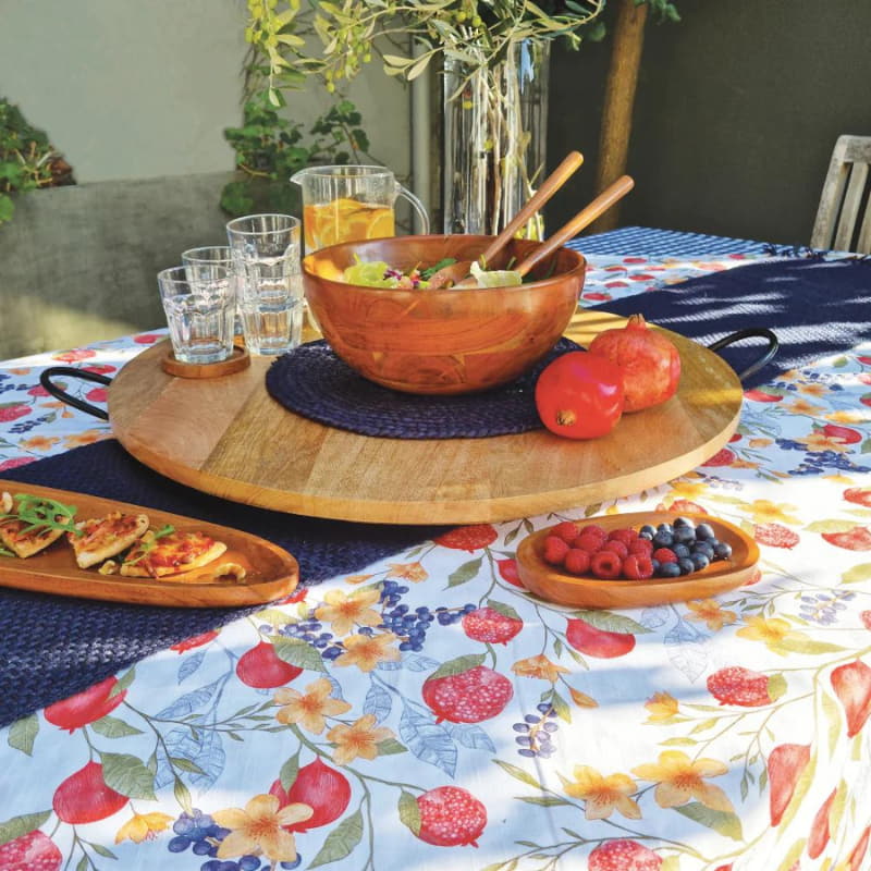alt="A white tablecloth featuring an exclusive print designed in a stunning table setup"