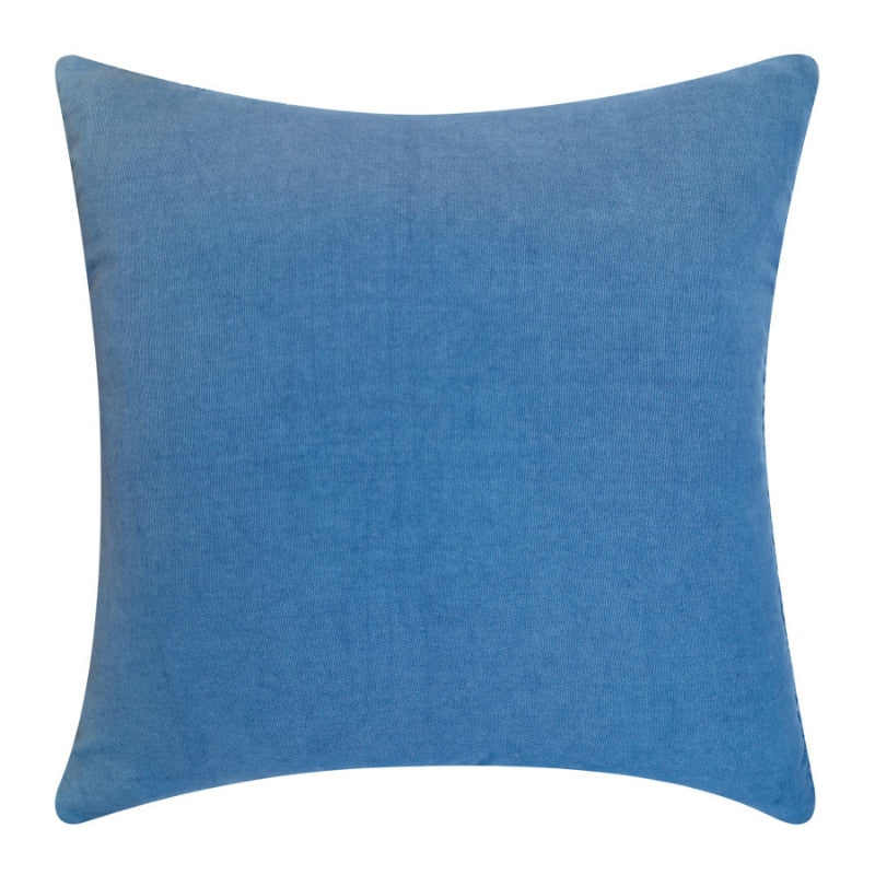 alt="Plain back details of a blue cushion featuring a cream check pattern"