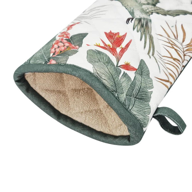 alt="Closer view of a stunning oven mitt featuring an exclusive hand-drawn tropical bird and foliage design."
